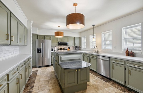 Gulfport House | Venetian Garden Retreat with Arcade Games & Hot Tub