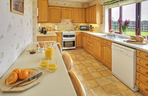 Belford Cottage | Very spacious living area & large secure garden, dog friendly