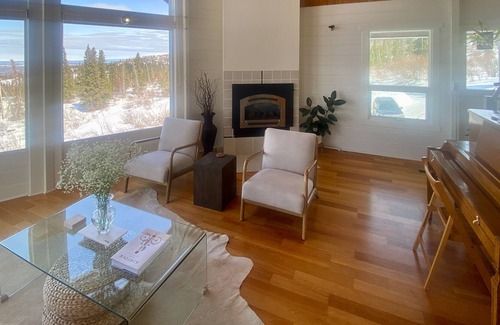 Hillside East House | Vibrant mountain view home with fireplace, game room, gas grill, deck & W/D