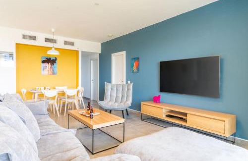 Nahariya Apartment | Vibrant Seaside Stay with Balcony by Sea N' Rent