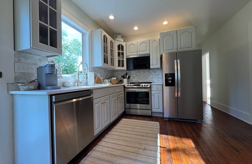Westbrook Center House | Victorian beach house and cottage family compound with large pool in Westbrook