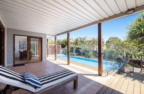 Emerald Beach House | Victoria’s Poolside Emerald Beach stay with Shared Pool, Near Beach and Cafes.