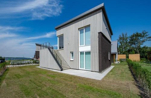 Kamperland House | Villa at Veerse Meer with Lake Views
