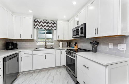 Punta Gorda Apartment | Villa Capri | Waterfront Luxury Retreat Heated Saltwater Pool Dock