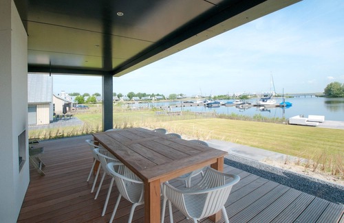 Tholen House | Villa in Netherlands with Waterfront Luxury