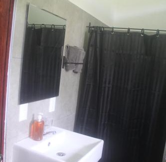 Chiguata Apartment | Villa Los Altos - Private Tree Suite Roof Top walk to Playa Chiquita