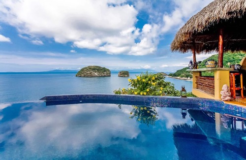 South Shore Hotel Area Villa | VILLA LOS ARCOS: 5 Star Oceanfront With Full Staff