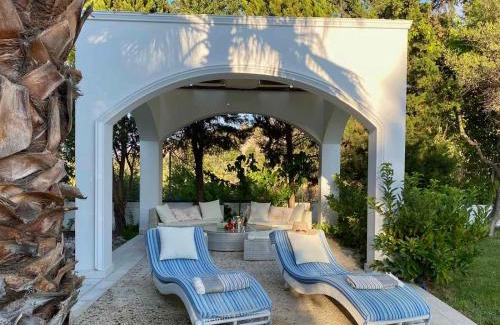 Archangelos Villa | Villa Sofia with garden, pool and lounge areas