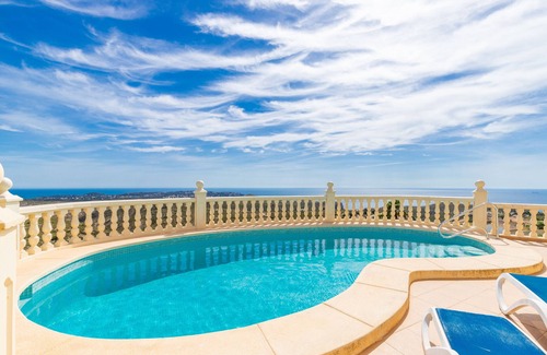 Benitachell Villa | Villa 'Vista Ibiza' with Sea Views, Private Pool, Garden, Balcony, Wi-Fi & A/C