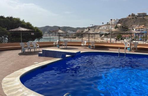 Faro de Cullera Apartment | Vista al mar con piscina