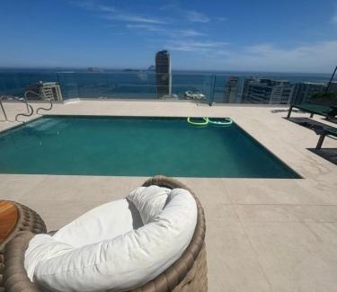 Leblon Apartment | Vista Mar no Top Flat Leblon com Piscina, Academia, Garagem e Arrumação Diária by Tata
