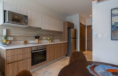 Gonzalo Guerrero Condo | Walk everywhere from our luxury 2-bedroom, 2-bath resort condo in the gorgeous new Ipana building