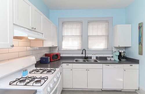 Columbia House | Walk or bike to Noma or Main Street district from this fun & peaceful retreat.