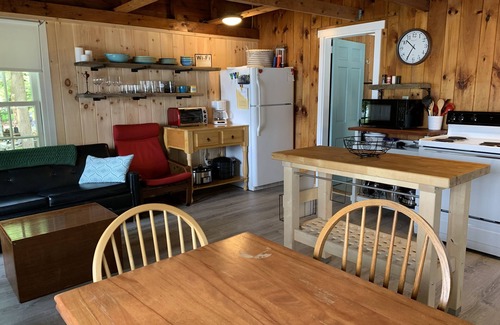Winthrop Cabin | Walk out beach in private cove on Cobboossee Lake