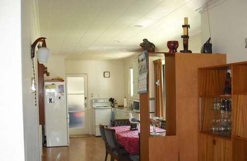 Whiritoa House | Walk straight onto the sand from the garden.