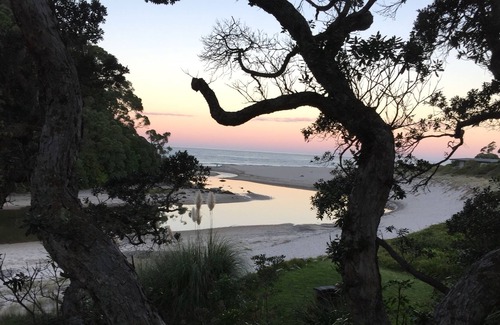 Whiritoa House | Walk straight onto the sand from the garden.