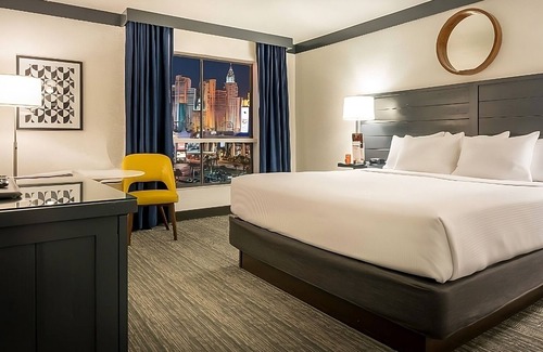 Las Vegas Hotel | Walking Distance to Las Vegas Strip! Amenities include Onsite Restaurants & Bar!
