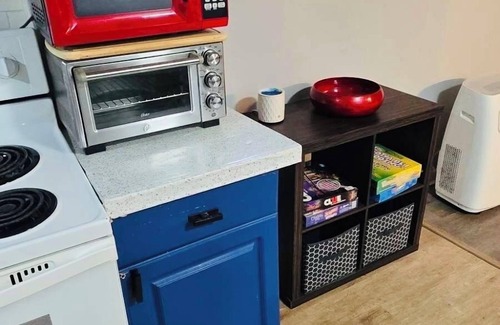 Troy House | Warm and cozy basement.