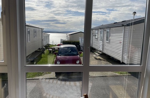 Hamworthy House | Water Lily lovely dog friendly caravan on Rockley Park, Poole Harbour + Sea View