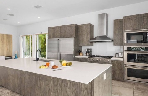 Leeward Settlement House | Waterfront Luxury Villa with Optional Boat and Beach Access Just Steps Away