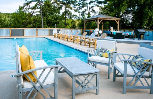 Steele Creek House | Waterfront, 100- Year-old Wood Cabin #16 at Long Cove Resort by Redawning