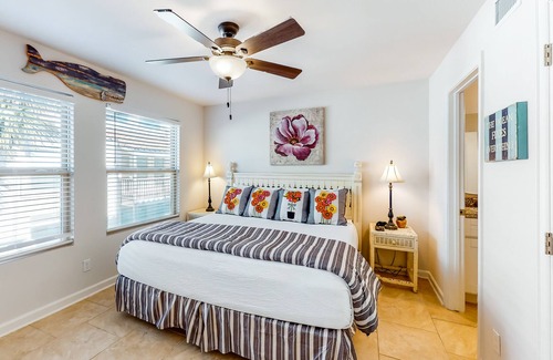 Harbor Oaks House | Waterfront condo with balcony, private boat slip, fishing pier, pools, & tennis