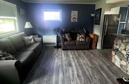 Elk Rapids Cottage | Waterfront cottage in Elk Rapids on Bass Lake. Firepit Pet ok