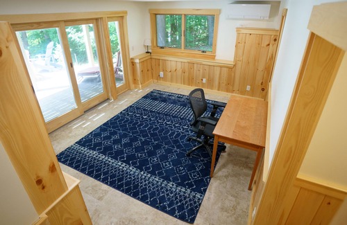 Oxford House | Waterfront Home with ample outdoor entertainment space on Thompson Lake