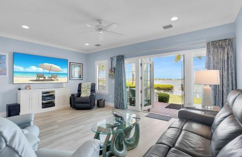 Coral Lagoon House | Waterfront luxury Villa 59 with sunset views and boat slip townhouse
