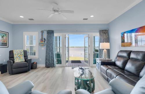Coral Lagoon House | Waterfront luxury Villa 59 with sunset views and boat slip townhouse