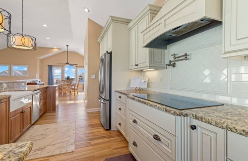 Manteo House | Waterfront,Pool,Game Room,Beach,DeepWaterAccess