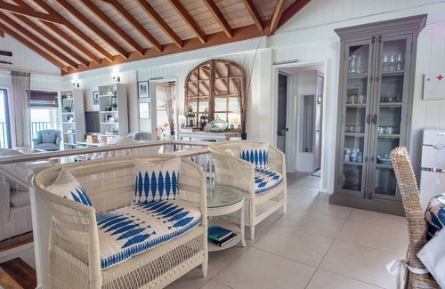 Liberta Villa | Waterfront Spacious 5-bedroom villa in Mamora Bay,Watersports Games room,