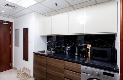 Dubai Sports City Apartment | Waves - Cozy, Fully Furnished Studio in Dubai Sports City