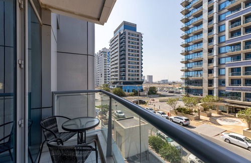 Dubai Sports City Apartment | Waves - Cozy, Fully Furnished Studio in Dubai Sports City