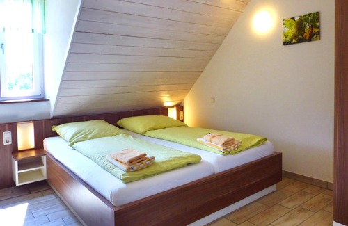 Volkach House | Weinbau & Pension – Familie Birgit und Bernhard Meusert