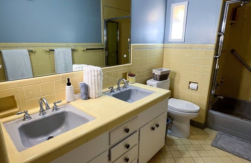 Wilmington House | Welcome to our charming mid-century capecod, located in the heart of Wilmington