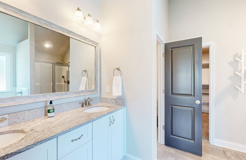 Harlem House | Well-appointed retreat with an expansive yard, foosball table, & soaking tub