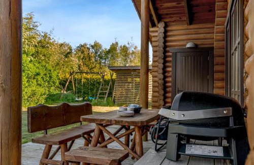 Fjerritslev House | Well-Maintained Log House With Hot Tub, Sauna And Covered Terrace In Thy