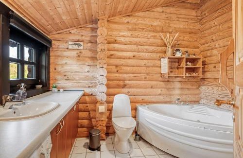 Fjerritslev House | Well-Maintained Log House With Hot Tub, Sauna And Covered Terrace In Thy