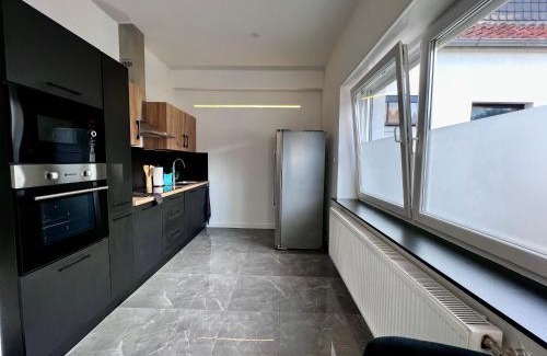 Loehne Apartment | Werre Apartments mit Smart-TV - stilvol, zentral & gemütlich