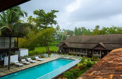 Varkala Hotel | West Bay Palm TreeHeritage Beach Resort