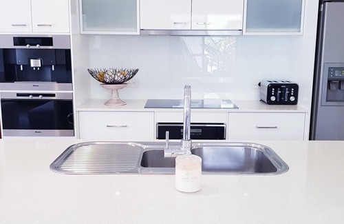 West Beach House | WEST BEACH resort style luxury. Recently refurnished living and dining room.