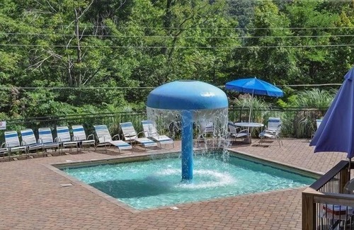 Chalet Village North Cabin | Whispering Waters 1 Bedroom Cabin by RedAwning