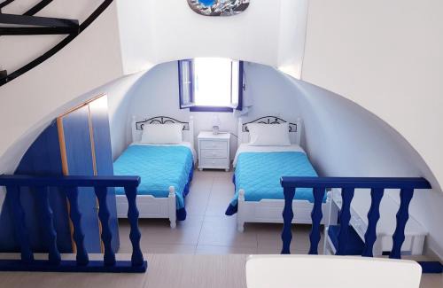 Perivolos Apartment | White & Blue