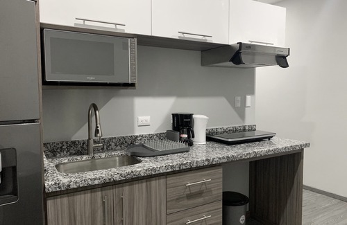 Tamarindo Apartment | Whitestone Parkview Tamarindo 2 queen bed studio w/kitchen 7 min walk to beach