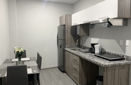 Tamarindo Apartment | Whitestone Parkview Tamarindo 2 queen bed studio w/kitchen 7 min walk to beach