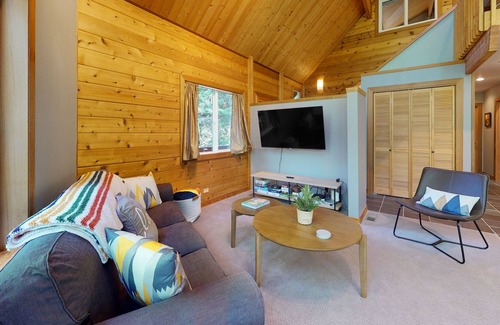 Sudden Valley House | Wilderness retreat on a double lot with a fireplace, large deck, & W/D