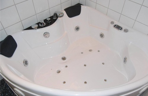 Bog By House | With a view of Bogø and Grønsund lies this beautiful cottage.