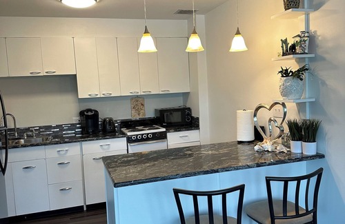 South Addition Apartment | Within walking distance to downtown. Near shopping, attractions, and nightlife