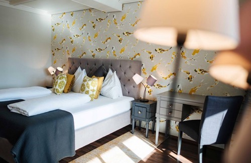 Feld am See House | Wohnzimmer Fisch&chips Frühstück 1-4 Nächte - Bike-boutiquehotel Lindenhof